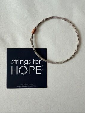 Strings for HOPE Recycled Wire Bracelet – Silver w/ Copper Accent | 3” Diameter